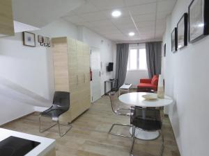 Posezení v ubytování Living Sevilla Apartments Hércules