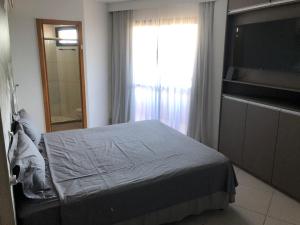Letto o letti in una camera di Studio particular em Hotel
