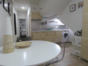 Kuchyň nebo kuchyňský kout v ubytování Living Sevilla Apartments Hércules