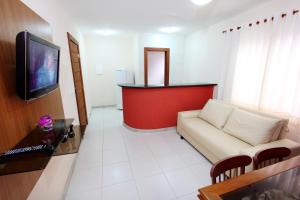 TV a/nebo společenská místnost v ubytování Aquaville Apart Hotel