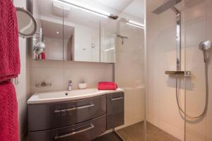 Koupelna v ubytování Appartements Enzian + 34 fotografií