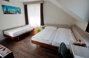 Posteľ alebo postele v izbe v ubytovaní Hotel Alexander Zurich Old Town