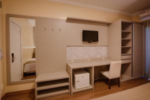 TV a/nebo společenská místnost v ubytování Hotel Pousada Kaster