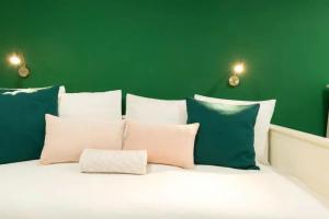 A bed or beds in a room at Budapest Downtown Museum Apartments