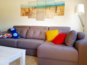 Posedenie v ubytovaní Apartamento con piscina en Oliva Nova