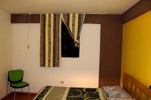 מיטה או מיטות בחדר ב-Kame House hostel