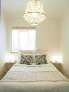 Postel nebo postele na pokoji v ubytování Pé N'Areia - Beach Apartment with Terrace