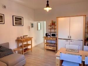 a living room with a couch and a table at Casa Francesco in Bolsena