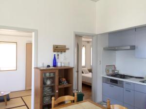 Köök või kööginurk majutusasutuses Vacances a la mer Ishigaki
