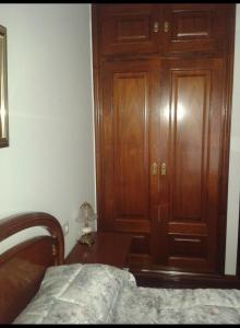 Łóżko lub łóżka w pokoju w obiekcie Apartamento en Terra do Porto con vistas