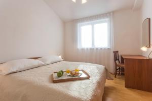 Posteľ alebo postele v izbe v ubytovaní Apartment Liznjan 1