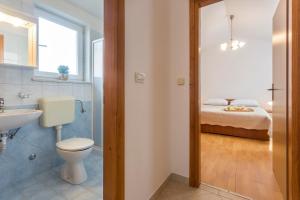 Kúpeľňa v ubytovaní Apartment Liznjan 1 + 26 fotografií