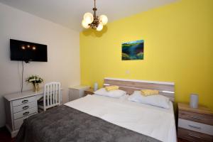 Posteľ alebo postele v izbe v ubytovaní Guesthouse Kamen Kuća