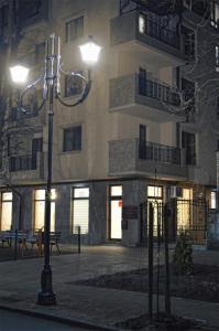 a street light in front of a building at night at Divona Studio 2 in Ruse