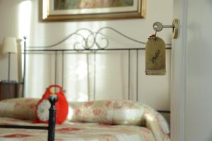 Postel nebo postele na pokoji v ubytování B&B La corte di Stelio