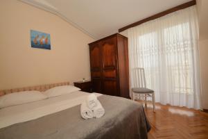 Posteľ alebo postele v izbe v ubytovaní Guesthouse Kamen Kuća