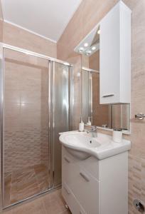 Kúpeľňa v ubytovaní Apartment Lopar 12