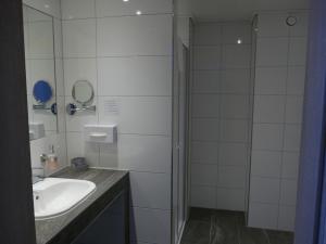 Koupelna v ubytování Hotel Diekgerdes, Komfortzimmer