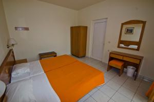 Postel nebo postele na pokoji v ubytování Stella Hotel