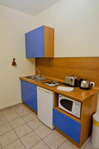 Kuchyň nebo kuchyňský kout v ubytování Stella Hotel