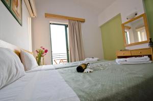 Postel nebo postele na pokoji v ubytování Stella Hotel