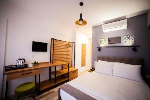 Postel nebo postele na pokoji v ubytování Set Özer Hotel