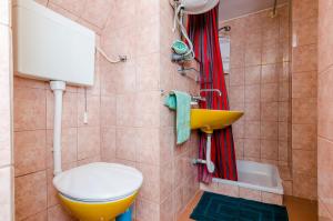 Ванная комната в Apartments & Rooms Mihajica