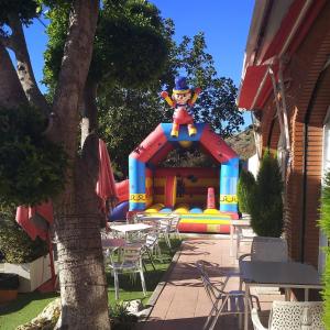 a large inflatable bounce house in a yard at Nuevo Montesol in Málaga