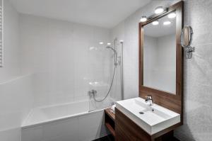 Kúpeľňa v ubytovaní Sándor Hotel