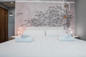 Postel nebo postele na pokoji v ubytování Hotel Cannaregio 2357