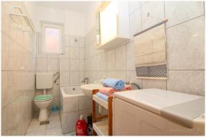 Apartments Zoro tesisinde bir banyo