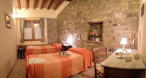 Postel nebo postele na pokoji v ubytování Casa Al Bosco
