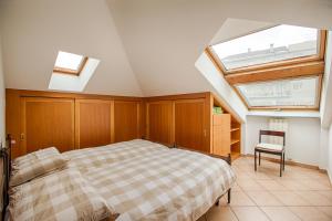 Giường trong phòng chung tại Casa Alpina - Aosta
