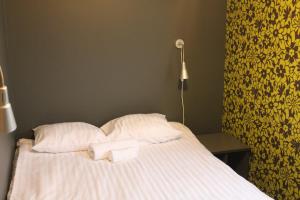 A bed or beds in a room at Tuhamäe Hostel