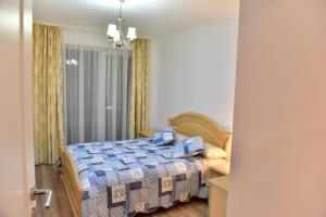 Krevet ili kreveti u jedinici u okviru objekta Sibiu City Residence