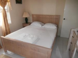 Postel nebo postele na pokoji v ubytování Sue's Homestay