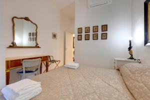 
Letto o letti in una camera di Faenza Apartment
