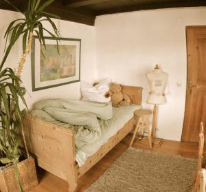 Tempat tidur dalam kamar di Schatzl Hütte