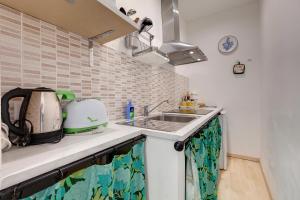 Dapur atau dapur kecil di Faenza Apartment