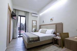 Postel nebo postele na pokoji v ubytování Hotel del Sole