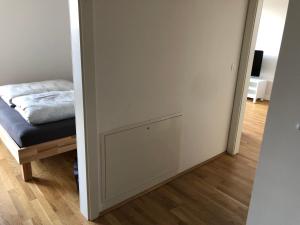 Łóżko lub łóżka w pokoju w obiekcie High 5