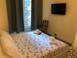 Posteľ alebo postele v izbe v ubytovaní Nunziata Apartment