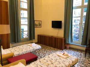 Posteľ alebo postele v izbe v ubytovaní Nunziata Apartment
