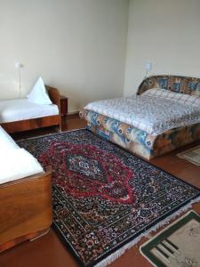 Ένα ή περισσότερα κρεβάτια σε δωμάτιο στο Hotel Sartepo