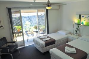 Voodi või voodid majutusasutuse Isla House Greenslopes toas