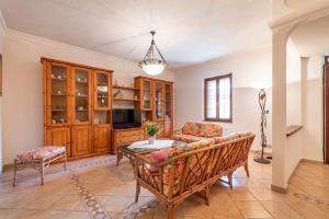 a living room with a couch and a table at Holiday home in Santa Maria La Palma 31431 in Santa Maria la Palma