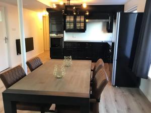 Η κουζίνα ή μικρή κουζίνα στο VAKANTIE WONING OASE +19 φωτογραφίες