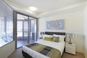 Letto o letti in una camera di Monaco Caloundra