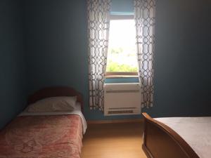 Postel nebo postele na pokoji v ubytování Apartmani Marica