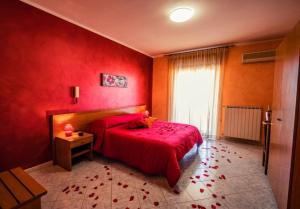 Postel nebo postele na pokoji v ubytování Hotel Venere